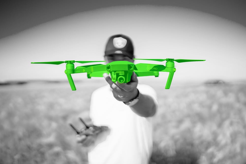 guy holding drone