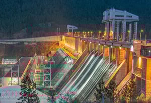 illuminated-hydroelectric-power-plant-barbed-wire-water-discharge